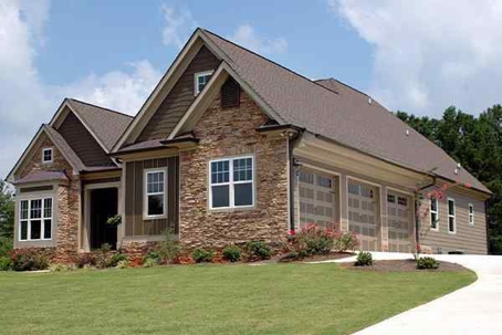 Nice home with a wide green lawn.